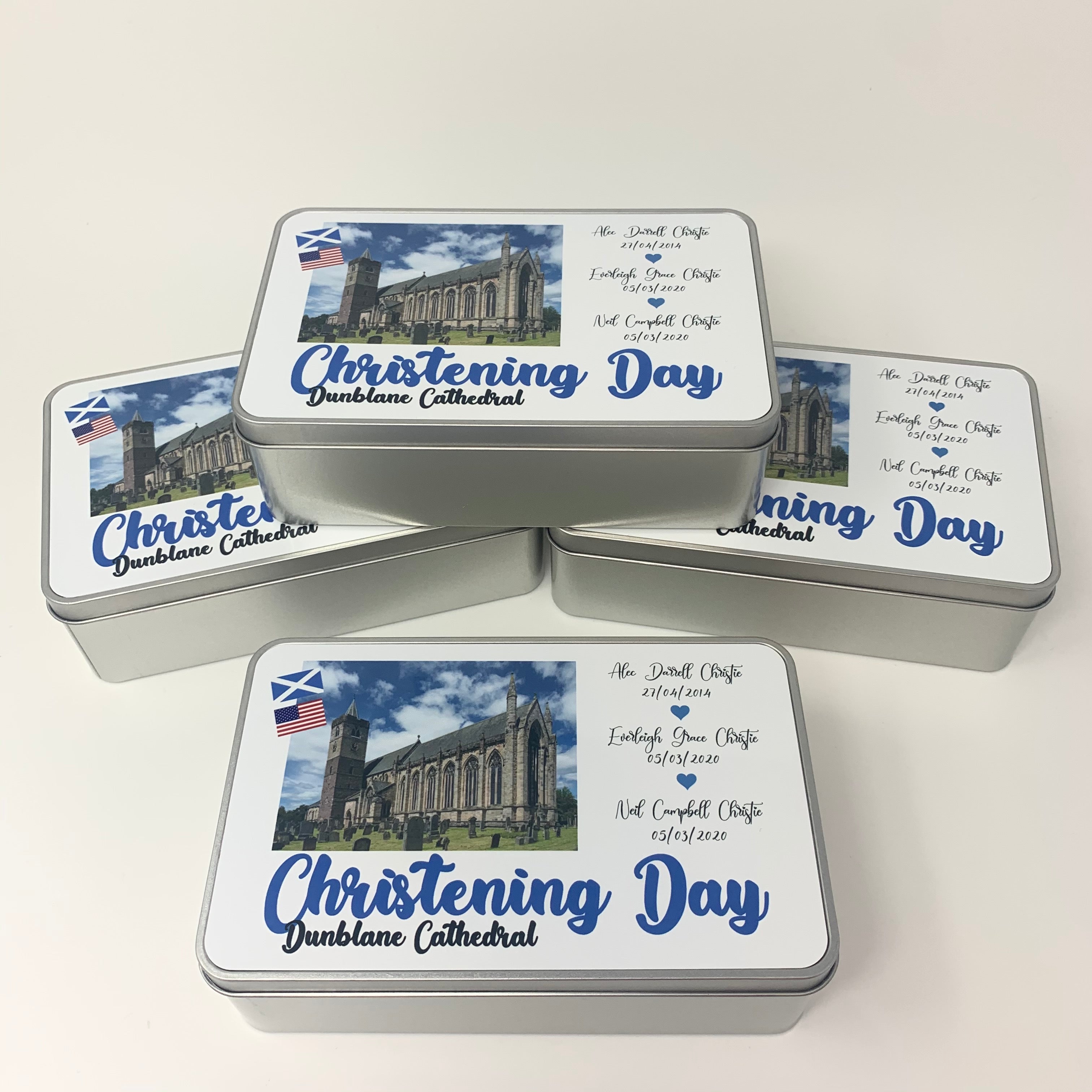 Four silver Tins with Christening Day written on them