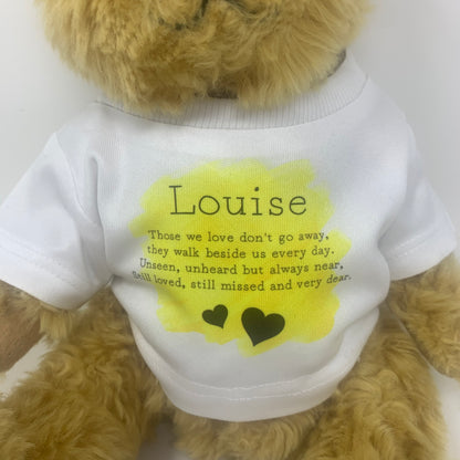 Heart-shaped纪念品 with text and a teddy bear on a white background