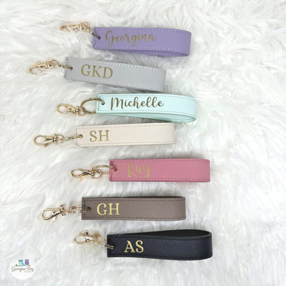 Set of personalized keychains with names on a white background