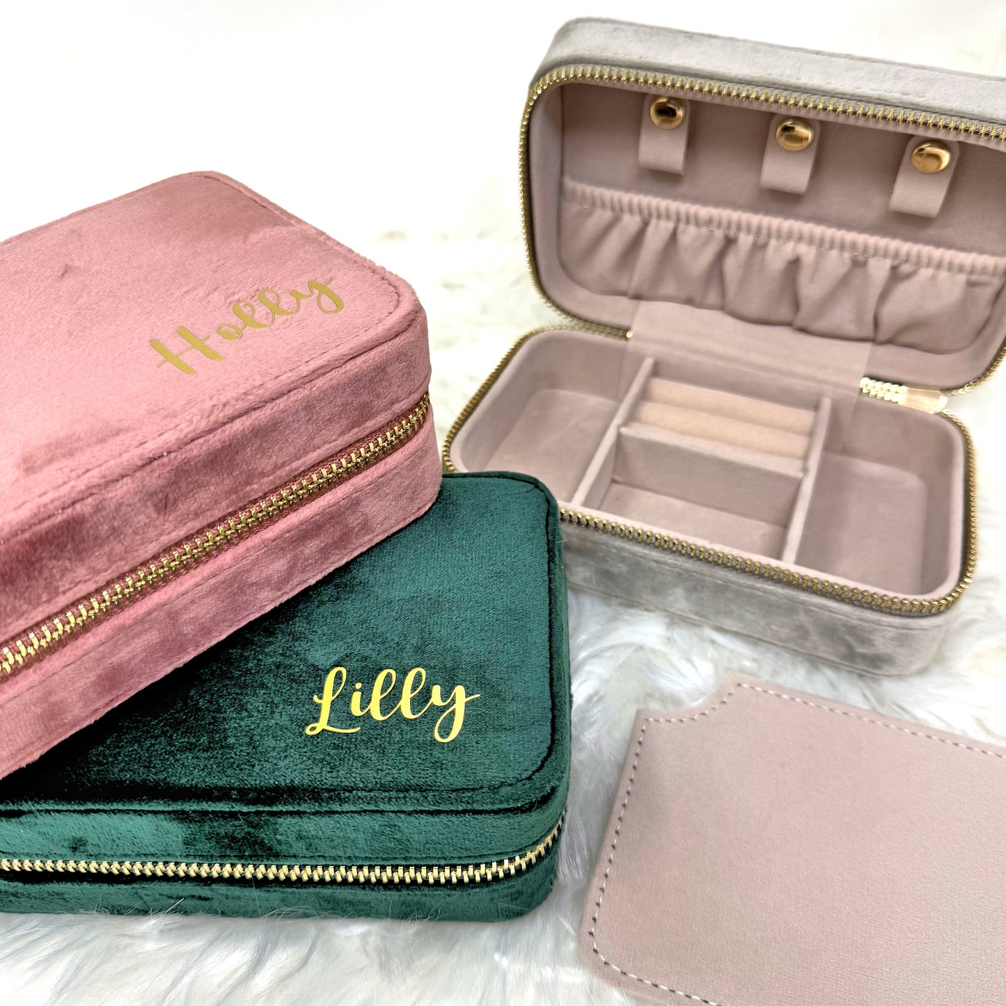 Jewelry cases with 'Lilly' branding on a white background