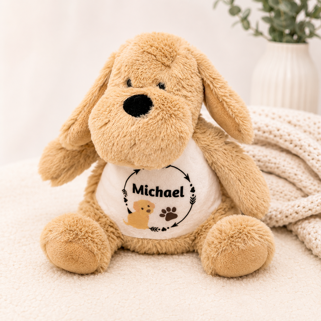 Plush dog toy with a shirt labeled 'Michael' on a light background