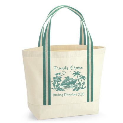 Beige tote bag with green striped handles and cruise-themed design on a white background