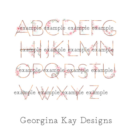 Alphabet letters with decorative flourishes and 'Georgina Kay Designs' branding on a white background
